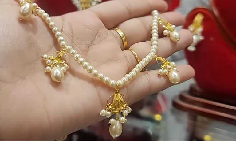 Gold necklace design with pearl