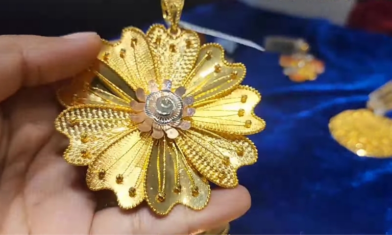 Gold locket design for girl