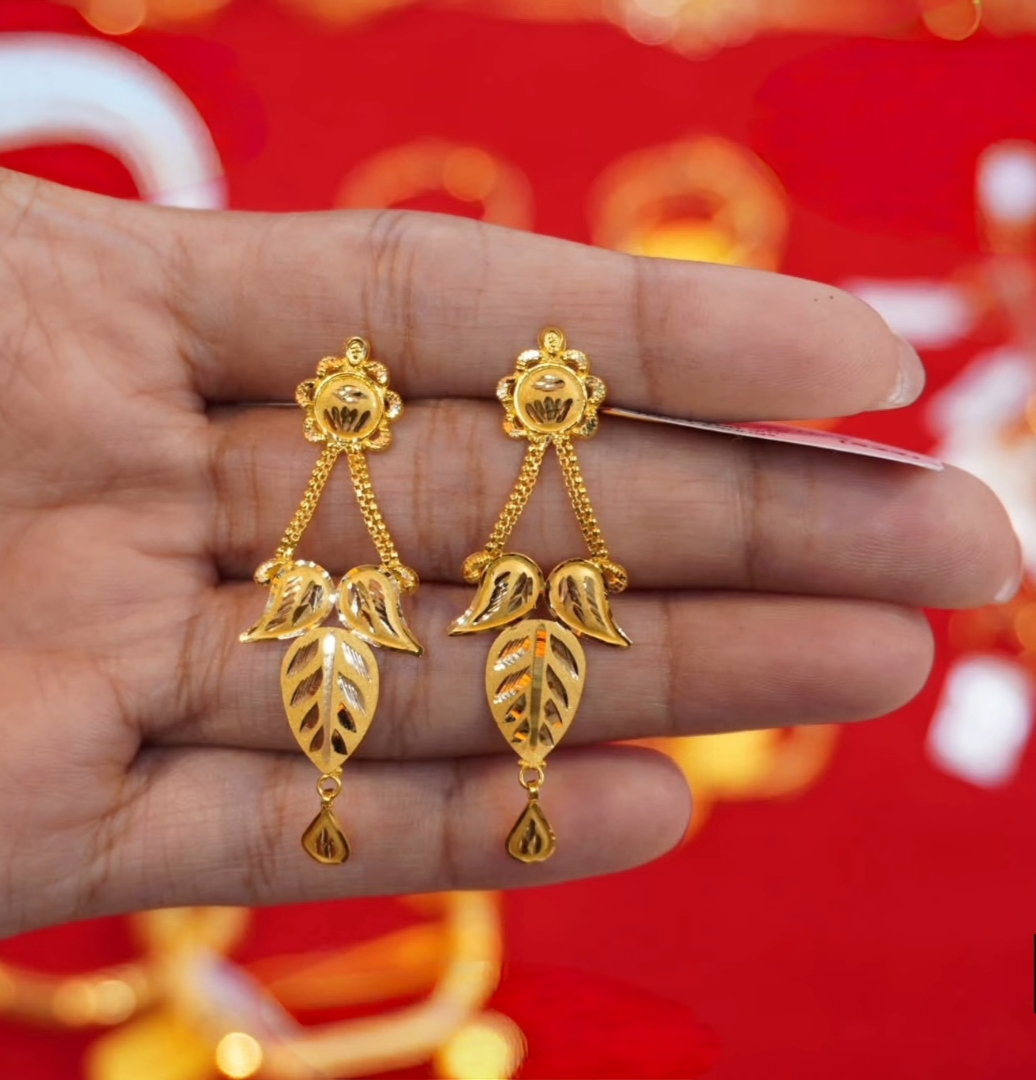 The earring design looks like a pigeon's wing.